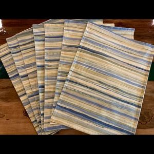 7 placemats. Blues/greens/yellow/ beige/tones. No stains. Clean backs. Beautiful